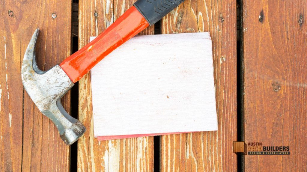 hammer and sand paper