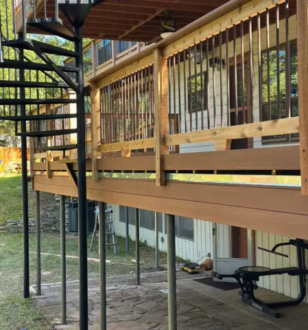 Wood deck with steel railings designed for stairs